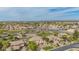 This is an aerial view of a home in a lively community with a variety of recreational options for an active lifestyle at 950 E Desert Inn Dr, Chandler, AZ 85249