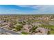 This is an aerial view of a home in a bustling neighborhood, featuring parks and community features at 950 E Desert Inn Dr, Chandler, AZ 85249