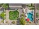 Aerial view of a private backyard with lush green lawn and a custom pool area at 950 E Desert Inn Dr, Chandler, AZ 85249