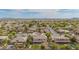This is an aerial view of a home with a pristine backyard in a peaceful neighborhood with mountain views at 950 E Desert Inn Dr, Chandler, AZ 85249