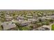 Gorgeous aerial view of a home in a desirable neighborhood, showcasing mature trees and well-maintained yards at 950 E Desert Inn Dr, Chandler, AZ 85249