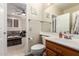 This bathroom features a toilet, sink, and large mirror with soft natural lighting, creating a tranquil space at 950 E Desert Inn Dr, Chandler, AZ 85249