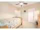 Well-lit bedroom with a wooden bed frame, and large windows, providing a calming retreat at 950 E Desert Inn Dr, Chandler, AZ 85249