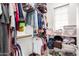 Organized walk-in closet features custom shelving and ample space for clothing, shoes, and accessories at 950 E Desert Inn Dr, Chandler, AZ 85249