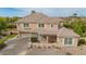 Stunning two-story home featuring stone accents, manicured landscaping, and a tile roof at 950 E Desert Inn Dr, Chandler, AZ 85249