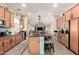 Open kitchen with a long island, granite countertops, ample cabinetry, and stainless steel appliances at 950 E Desert Inn Dr, Chandler, AZ 85249