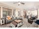 An open layout connects the living room to the staircase and kitchen beyond at 950 E Desert Inn Dr, Chandler, AZ 85249