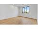 Bedroom with hardwood floors, ample natural light, and neutral tones at 100 W Northern Ave # 4, Phoenix, AZ 85021