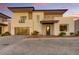 Contemporary two-story home with a two-car garage and meticulously landscaped front yard at 100 W Northern Ave # 4, Phoenix, AZ 85021