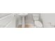 Bathroom with a pedestal sink, tiled floors, and a white toilet at 26949 W Lone Cactus Dr, Buckeye, AZ 85396