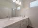 Bright bathroom featuring double sinks and vanity at 300 N Gila Springs Blvd # 144, Chandler, AZ 85226