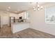 Modern kitchen featuring white cabinets, stainless steel appliances, and subway tile backsplash at 300 N Gila Springs Blvd # 144, Chandler, AZ 85226