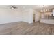 Open floor plan showcasing living room seamlessly connected to modern kitchen and dining area at 300 N Gila Springs Blvd # 144, Chandler, AZ 85226