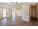 Spacious living room showcasing wood-look flooring and modern finishes at 300 N Gila Springs Blvd # 144, Chandler, AZ 85226