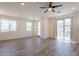 Spacious living room featuring recessed lighting, wood-look flooring, and sliding glass doors at 300 N Gila Springs Blvd # 144, Chandler, AZ 85226