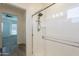 Glass-enclosed shower featuring brushed nickel fixtures and accessories with a view of the bedroom at 300 N Gila Springs Blvd # 144, Chandler, AZ 85226