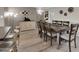 Spacious dining room features a large table and seating, perfect for hosting gatherings and Gathering meals at 10543 E Sahuaro Dr, Scottsdale, AZ 85259