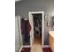 Bathroom featuring tile floors, walk-in closet, and neutral wall color at 11590 W Cocopah St, Avondale, AZ 85323