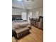Comfortable bedroom with natural light and rustic-style furniture at 11590 W Cocopah St, Avondale, AZ 85323