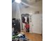 Bedroom with a closet, personal items, and hard wood flooring at 11590 W Cocopah St, Avondale, AZ 85323