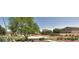 A community park featuring a basketball court, green spaces, and a shaded picnic area at 11590 W Cocopah St, Avondale, AZ 85323
