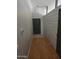 Welcoming entryway features wood-look floors and accent wall paneling at 11590 W Cocopah St, Avondale, AZ 85323