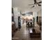 Open concept living room features a dining area and kitchen with an island at 11590 W Cocopah St, Avondale, AZ 85323