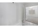 Bright hallway showcasing tile flooring and a seamless transition to the bedroom at 1248 E Briarwood Ter, Phoenix, AZ 85048