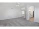 Spacious main bedroom with neutral colors, ceiling fan, and ensuite bathroom access at 1248 E Briarwood Ter, Phoenix, AZ 85048