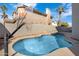 Backyard pool features cool, clear water, tile trim and a sports area behind it at 1248 E Briarwood Ter, Phoenix, AZ 85048