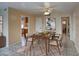 Cozy dining area with wood table, fan, and bright light perfect for entertaining at 130 E Coronado Rd # 16, Phoenix, AZ 85004
