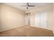 Bedroom with neutral walls, carpet, and a large closet at 14575 W Mountain View Blvd # 621, Surprise, AZ 85374