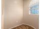 Empty bedroom with small window, neutral walls, and carpeted floor at 14575 W Mountain View Blvd # 621, Surprise, AZ 85374