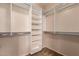 Walk-in closet with ample shelving and hanging storage at 14575 W Mountain View Blvd # 621, Surprise, AZ 85374