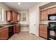Functional kitchen with ample cabinetry, granite counters, and modern appliances at 14575 W Mountain View Blvd # 621, Surprise, AZ 85374