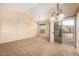 Spacious living room with sliding glass doors to an outdoor patio at 14575 W Mountain View Blvd # 621, Surprise, AZ 85374
