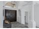 Inviting foyer with high ceilings, stylish chandelier, and sleek tile flooring at 14841 N 62Nd Way, Scottsdale, AZ 85254