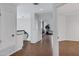 Bright hallway with hardwood floors leading to bedrooms and living area at 14841 N 62Nd Way, Scottsdale, AZ 85254