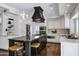 Gourmet kitchen features stainless appliances, a large island with seating, and ample natural light at 14841 N 62Nd Way, Scottsdale, AZ 85254