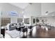 Open-concept living space with high ceilings, large windows, and stylish dining area at 14841 N 62Nd Way, Scottsdale, AZ 85254