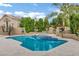 Beautiful swimming pool and hot tub surrounded by lush landscaping at 14841 N 62Nd Way, Scottsdale, AZ 85254