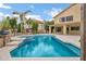 Backyard view featuring a private pool, hot tub, patio and built-in barbeque at 14841 N 62Nd Way, Scottsdale, AZ 85254