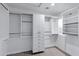 Bright walk-in closet with custom organizers and shelving units providing ample storage space at 14841 N 62Nd Way, Scottsdale, AZ 85254