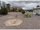 Expansive backyard featuring gravel landscaping, desert plants, and space for entertaining at 16805 N 110Th Ave, Sun City, AZ 85351