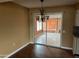 Dining room with chandelier and sliding door leading to the lanai at 16805 N 110Th Ave, Sun City, AZ 85351