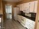 Functional kitchen with white appliances and ample cabinet space at 16805 N 110Th Ave, Sun City, AZ 85351