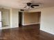 Open-concept living room with hardwood flooring, plenty of natural light at 16805 N 110Th Ave, Sun City, AZ 85351