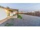 Spacious backyard with a patio and gravel, providing a low-maintenance outdoor space at 1718 S Marilyn Ann Dr, Tempe, AZ 85281