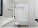 Bright bathroom showcases white subway tile, and a shower and bathtub combo at 1718 S Marilyn Ann Dr, Tempe, AZ 85281