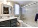 Bathroom featuring a modern vanity, framed mirror, and glass enclosed shower at 17200 W Bell Rd # 1643, Surprise, AZ 85374